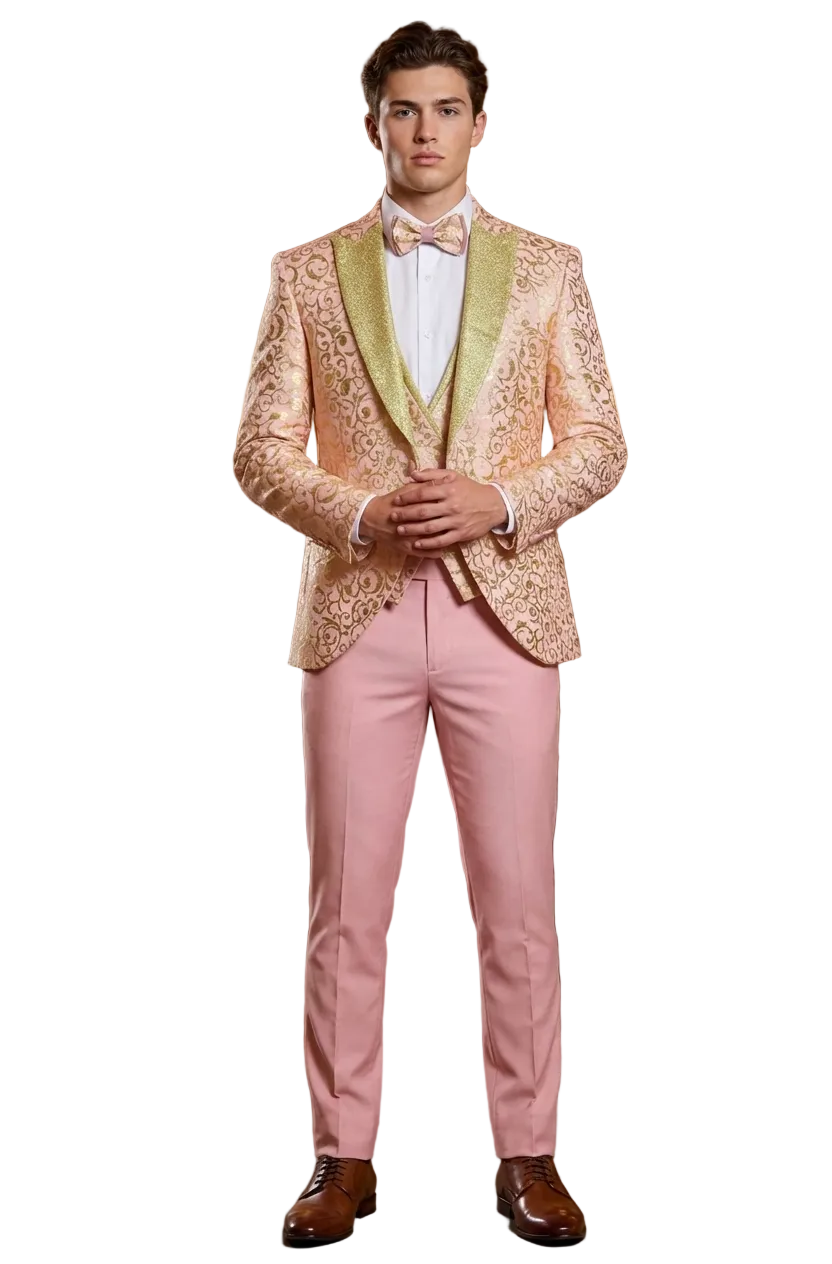 Man in a formal outfit with a pink jacket and pants in an elegant room.