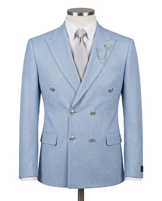 A light blue double-breasted suit jacket displayed on a mannequin torso, styled with a white dress shirt, light gray tie, and a silver chain brooch on the lapel, against a neutral gray background.
